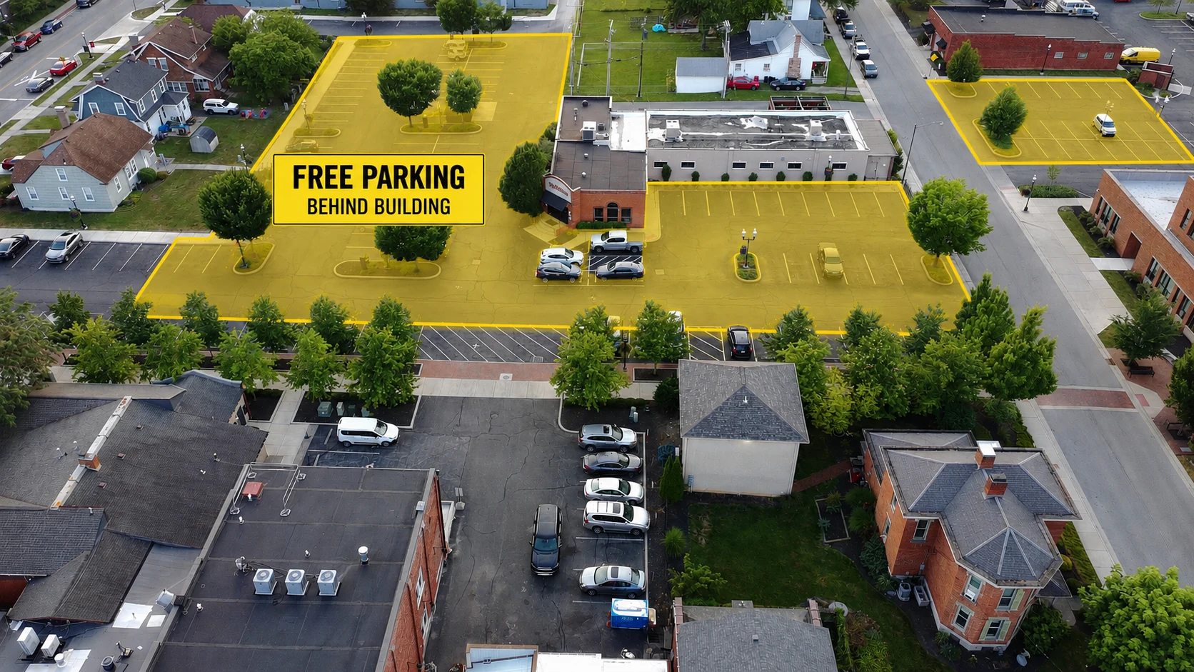 Aerial map highlighting free parking behind Blu-Willy's and nearby public lots
